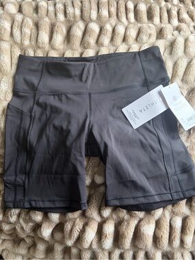 Athleta Charcoal High-Rise Bike Shorts with Side Pockets